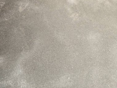 Eski beton duvarın dokusu. Açık gri çimento desenli beton duvar. Gri pastel, çatlak, çimento, beton, taş, sıva, duvar, boyalı düz zemin. Yüksek çözünürlüklü, beton zemin.