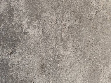 Eski beton duvarın dokusu. Açık gri çimento desenli beton duvar. Gri pastel, çatlak, çimento, beton, taş, sıva, duvar, boyalı düz zemin. Yüksek çözünürlüklü, beton zemin.