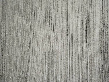 Siyah ve beyaz titreşimli tamamlanmamış duvar. Eski beton duvarın dokusu. Açık gri renkli çimento desenli beton duvar. Gri pastel, sert, çatallı beton, beton, alçıdan duvar, düz, soluk arkaplan boyalı..