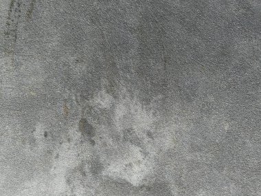 Siyah ve beyaz titreşimli tamamlanmamış duvar. Eski beton duvarın dokusu. Açık gri renkli çimento desenli beton duvar. Gri pastel, sert, çatallı beton, beton, alçıdan duvar, düz, soluk arkaplan boyalı..