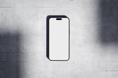 Phone with a blank white screen on a concrete background clipart