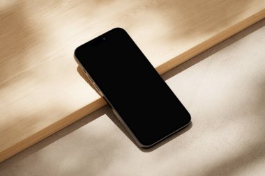 iPhone with black screen on the wooden planks clipart