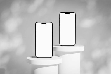 Scene with two mobile phones with blank white screen on the podium clipart