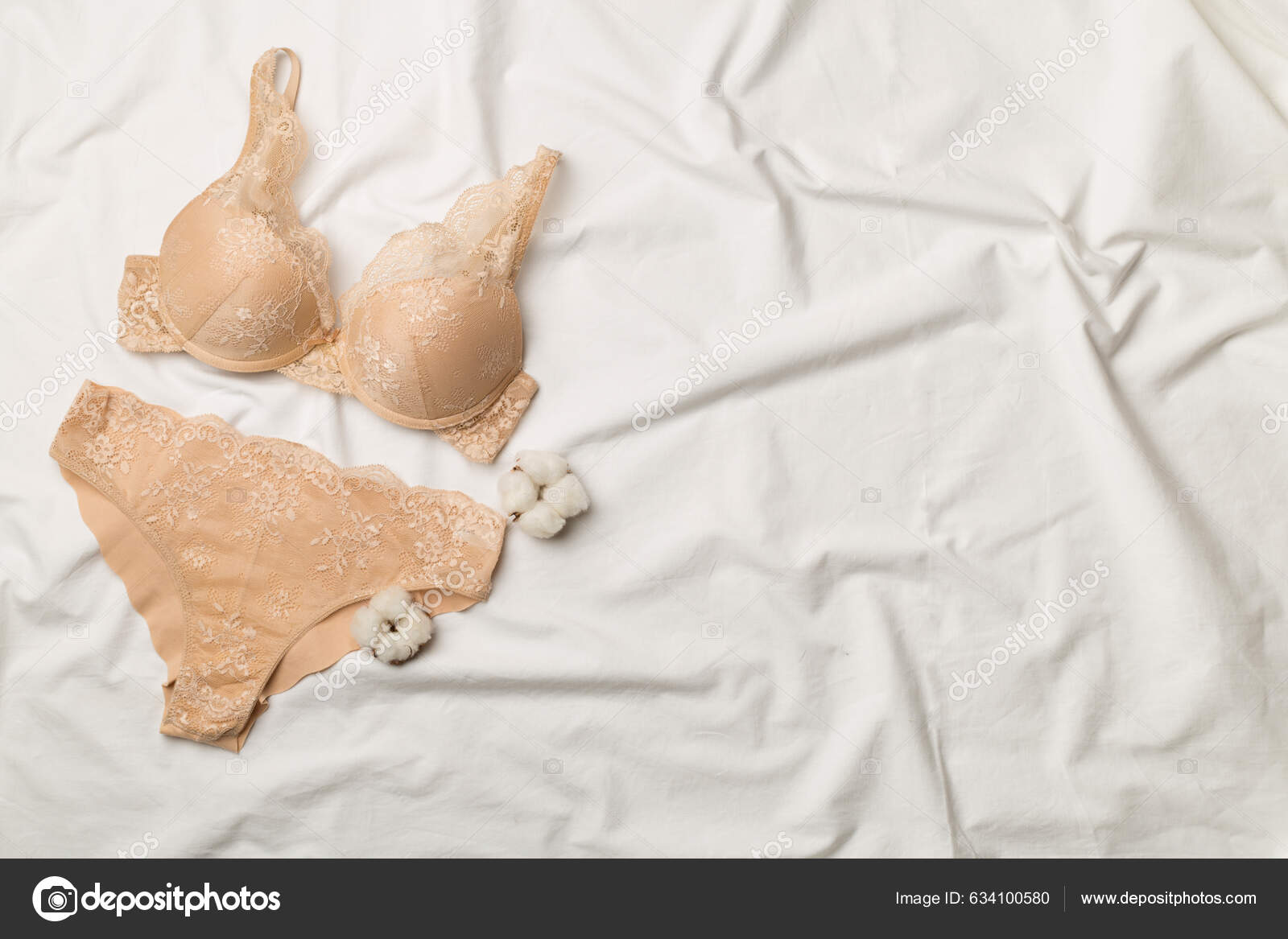 Lace Womens Underwear on White Bed Background. Flat Lay, Top View
