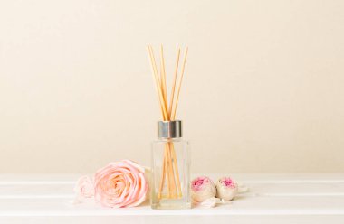 Air refresher bottle on light background.