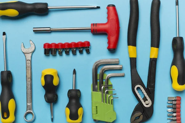 stock image Set of tools on color background, top view