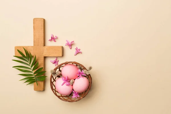 Pink Easter Eggs Cross Palm Leaves Color Background Top View — Stock Photo, Image