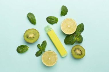 Disposable electronic cigarettes with fruits on color background, top view