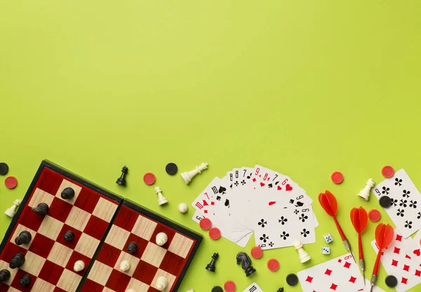 Different Board Games Color Background Top View — 图库照片