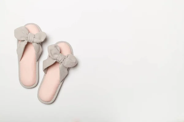 Soft Pink Slippers Color Background Top View — Stockfoto