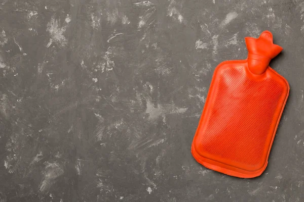 Rubber water warmer bag on concrete background