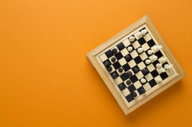 Chess on color background, top view