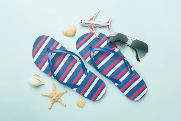 Flip Flops Sunglasses Airplane Color Background Top View Royalty Free Stock Images