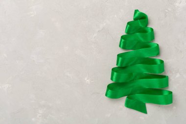 Creative handmade christmas tree on concrete background, top, view clipart