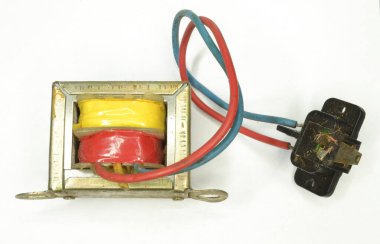 A solenoid - device comprised of a coil of wire, the housing and a moveable plunge