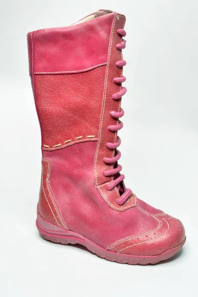 Beautiful vintage children boot on white background