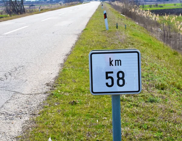 Road sign that shows Road mileage