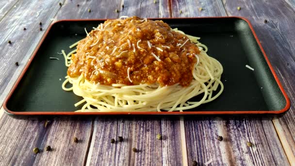 Pasta Spaghetti Bolognese Sprinkled Grated Parmesan Cheese Close — Stock Video