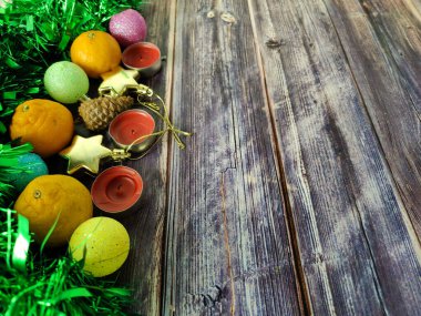 Christmas decoration. Green rain, Christmas balls, stars and gifts. Good New Year spirit