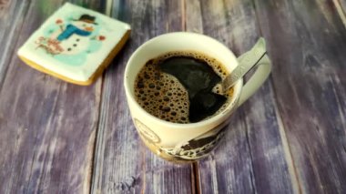 Timelapse of fragrant black coffee in a cup, movement of hot steam. Shooting from above