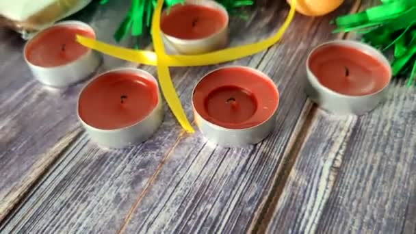 Christmas Decorations Red Candles Snowman Cookies Wooden Table Shooting — Stockvideo
