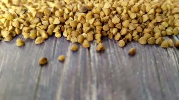 Dry Buckwheat Wooden Table Cereals Bulk Products — Stock video