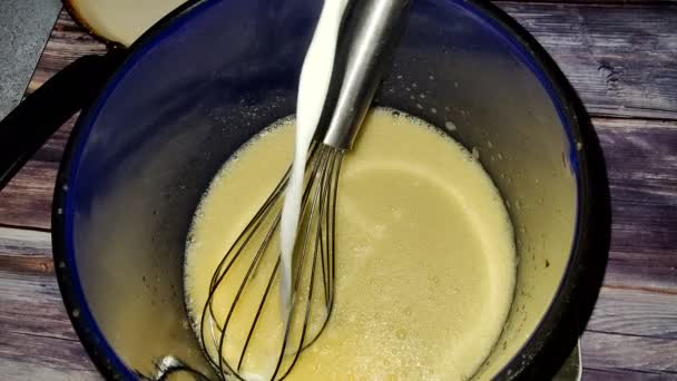 Adding Milk Beaten Eggs Blue Saucepan Cooking Pancakes View — 비디오