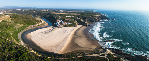 Aerial panorama Praia de Odeceixe beach in Vicentine Coast Nature Park, Algarve, Portugal