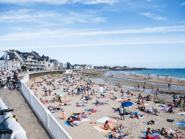 Stock image Quiberon, France: August 8th 2024: La Grande Plage Quiberon beach crowded in summer