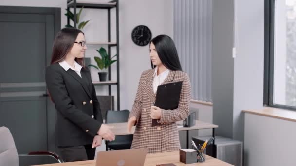 Two Young Business Women Shake Hands Each Other Look Camera — Stock Video