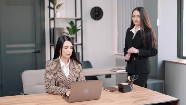 Female Manager Insurer Consulting Customer Laptop Meeting Young Saleswoman Showing — Stock Video
