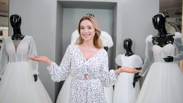 Young Girl Poses Bridal Shop Background Bridal Gown Model Show — Stockvideo