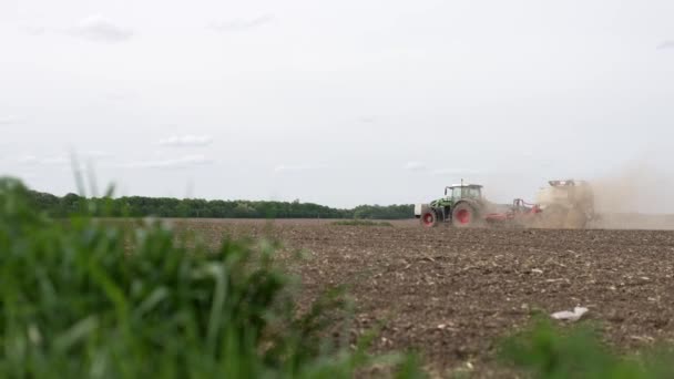 Tractor Sows Field Soybeans Seeder — Stock video