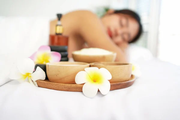 Close up spa massage sugar scrub.  Spa beauty massage healthy wellness.  Spa Thai therapy treatment aromatherapy for body woman. Young woman enjoying and relax massage in spa salon. Lifestyle and Cosmetic Healthy Concept
