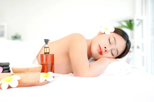 Spa beauty massage healthy wellness.  Spa Thai therapy treatment aromatherapy for body woman. Young woman enjoying and relax massage in spa salon. Lifestyle and Cosmetic Healthy Concept
