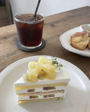 delicious sweet cake with chocolate and cream