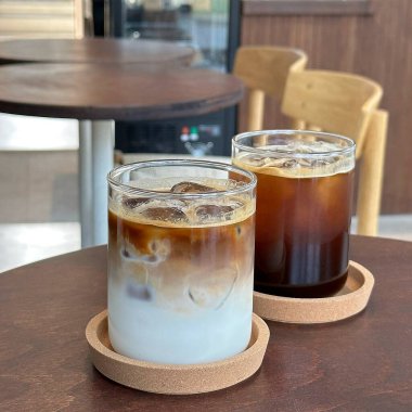 iced coffee with milk and ice cubes