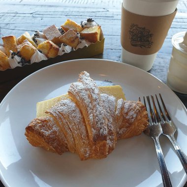 delicious croissant with chocolate and ice cream