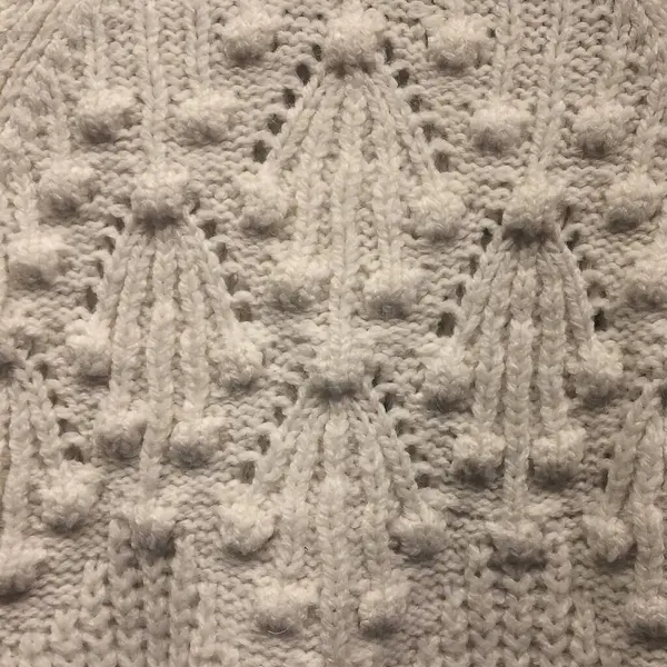 doku arkaplanı. Kumaş. Gri yün. beyaz örgü arkaplan.