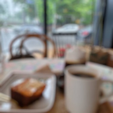 Arka planda Bokeh ve kahve ile bulanık arkaplan