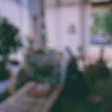 Modern oturma odasının iç tarafıyla soyut bulanık arkaplan.