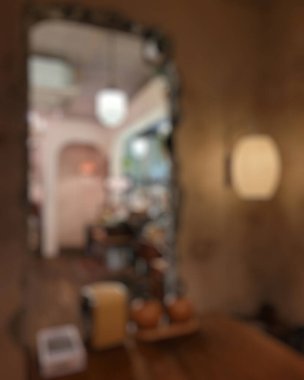 blurred background of modern restaurant with bokeh.