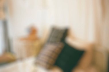 Bulanık bokeh ile modern oturma odası arka planı.