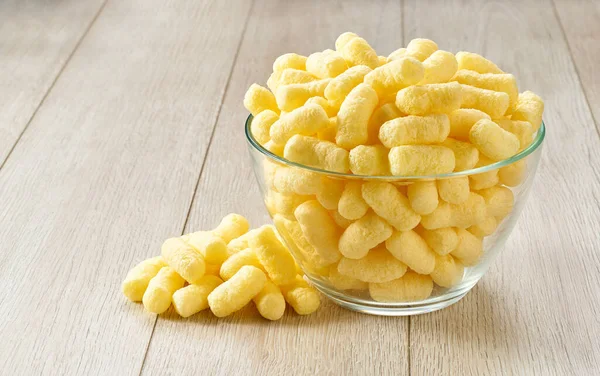 Crunchy Corn Snacks Glass Bowl White Wooden Table Copy Space — Stock Photo, Image