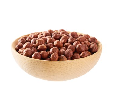 Hazelnut in a wooden bowl. Nut hazelnuts in a wooden bowl isolated on white background
