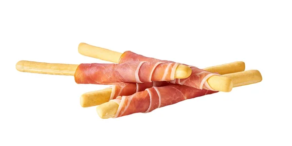 stock image grissini or breadsticks with parma ham prosciutto isolated on white background. breadsticks with prosciutto isolated .