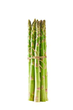 Bunch of green raw asparagus isolated on white background.