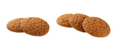 Beyaz arka planda izole edilmiş lezzetli yulaf ezmeli kurabiyeler, tam derinlik. Lezzetli yulaflı kurabiyeler izole edilmiş. Kahvaltı için sağlıklı yiyecekler ya da izole edilmiş atıştırmalıklar..