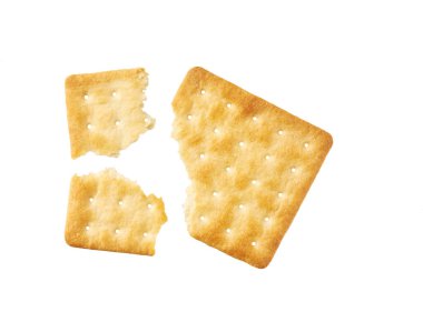 Broken square water crackers isolated on white background, top view. soup crackers isolated. Wheat water cracker isolated. clipart