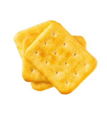 Beyaz arka planda izole edilmiş küçük peynir aromalı kraker yığını, üst görünüm
